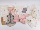 a lot of clothes that are sitting on a table