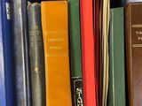 many books that are in a box on the table