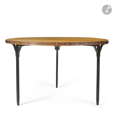 a wooden table with metal legs and a wooden top