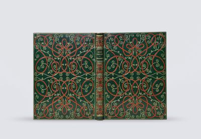 two green and red book covers with intricate designs on them