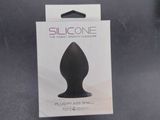 a plastic object in the package on the table