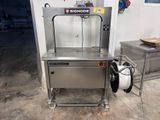 an image of a machine that is sitting in a garage