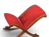 an image of a rocking chair with a red cushion on it