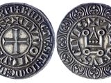 une pièce d'argent avec une croix au recto et une croix au verso