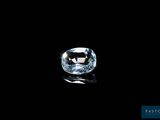 a blue topazte gems on a black background