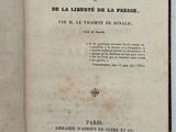 an open book with a black and white title on it