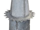 a cement vase with a flower on top of it