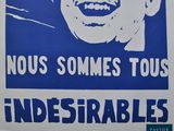 a blue and white poster with a picture of a smiling man