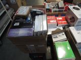 many boxes of electronic equipment sitting on the floor