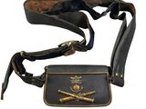 an old leather belt with a metal buckle and two crossed swords