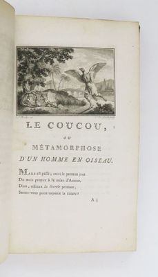 un livre ouvert avec l'image d'un homme et d'un chien