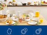 many plates of food on the table in the kitchen