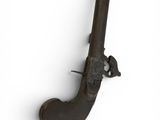 an old gun on a white surface with a white background