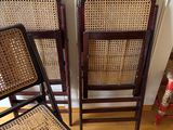 three wooden chairs sitting next to each other on a hard wood floor