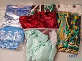 many different types of clothing in a plastic bag