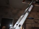 a crane that is attached to the ceiling of a building