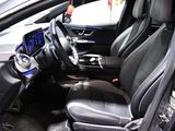 a picture of the inside of a car with a steering wheel