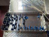 a close up of a bunch of tools in a metal tray