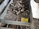 a metal box filled with lots of tools on top of a table