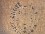 a close up of a piece of cloth with a logo on it