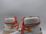 white leather boots with orange laces on a white background