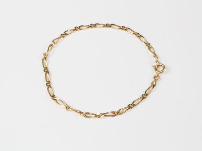 Bracelet en or jaune, maille variation gourmette. Larg. 2,7 …