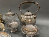 a lot of silver items that are on a table