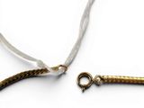 a close up of a rope with a clasp attached to it