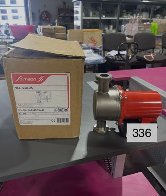 a box and a pump on a table in a store