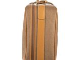 the back of a brown and tan suitcase with a handle