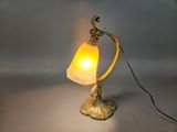 an image of a table lamp with a bird on top of it