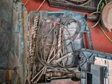 a suitcase full of wires and wires on the floor