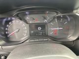 a close up of a car dashboard with a speedometer and gauges