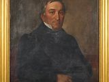 un tableau représentant un homme tenant un livre à la main