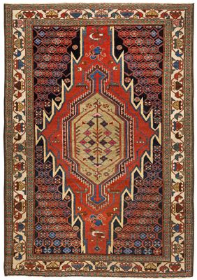 un tapis rouge et bleu à motifs géométriques