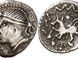 a silver coin with an image of a man on it
