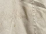 a close up of a person ' s shirt with a cat on it