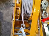 a box that has a rope and a winch on it
