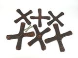 four crosses made out of wood on a white surface