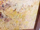 a picture of a painting on the wall of a room