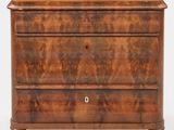 an early 20th century walnut chest of drawers