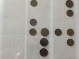a lot of coins on the table with a coin in the middle