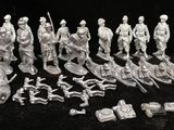 an old black and white photo of a group of figurines