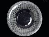 an image of a glass bowl on a black background