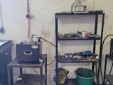 an image of a room that has a bunch of items on it