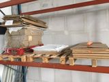 a stack of boxes on a pallet in a warehouse