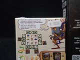 a box that has a game on it and a game card in it