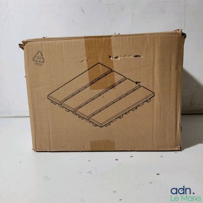 cardboard box sitting on a table with a drawing of a box on top of it