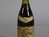 a bottle of wine that is sitting on a table
