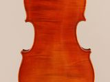 an old violin with a wooden back and bow on a white background